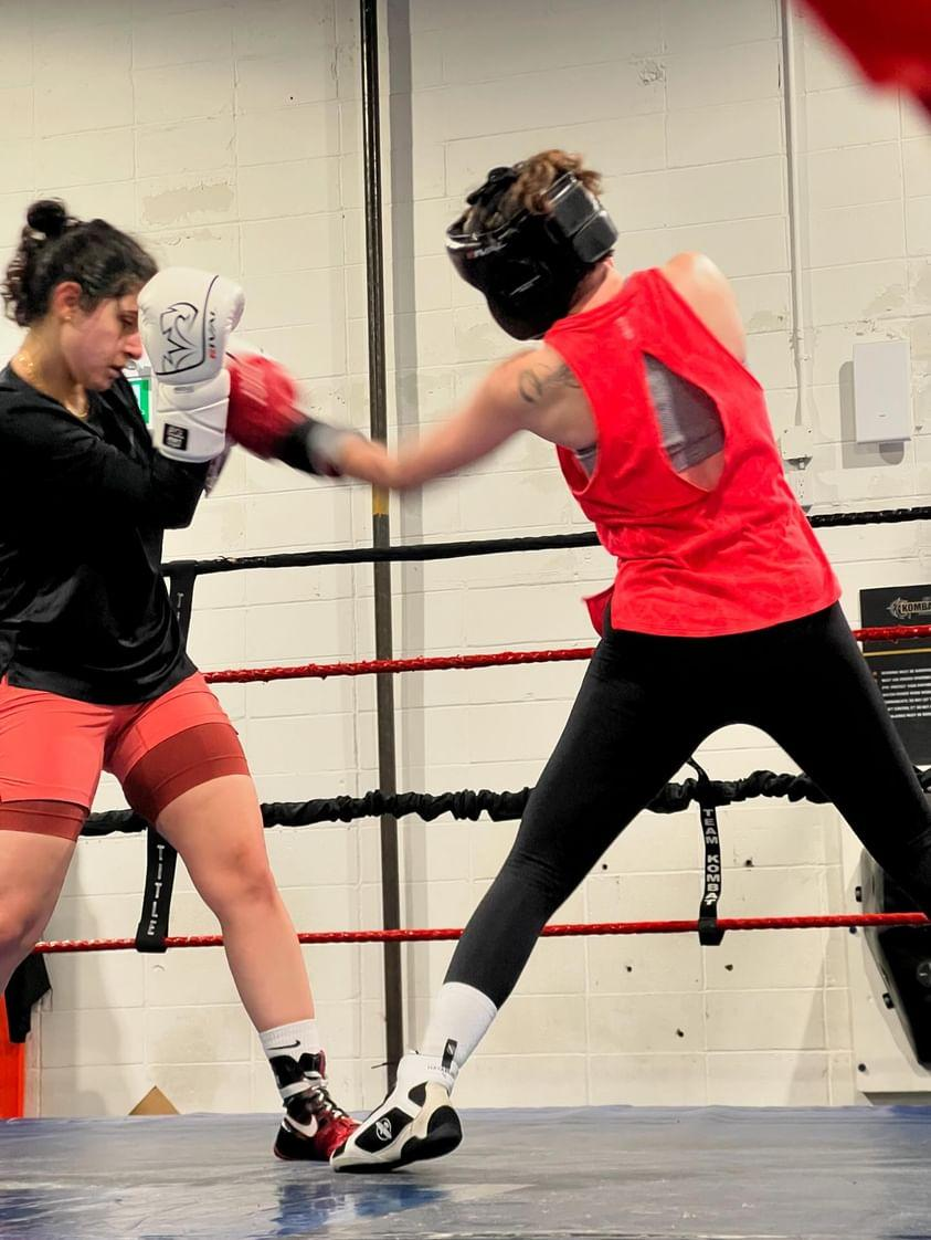 Sparring exchange in the ring